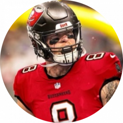 A sports man wearing a helmet staring at opponents